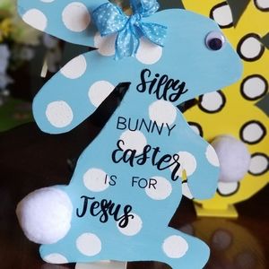 Painted wood Bunny on stand.